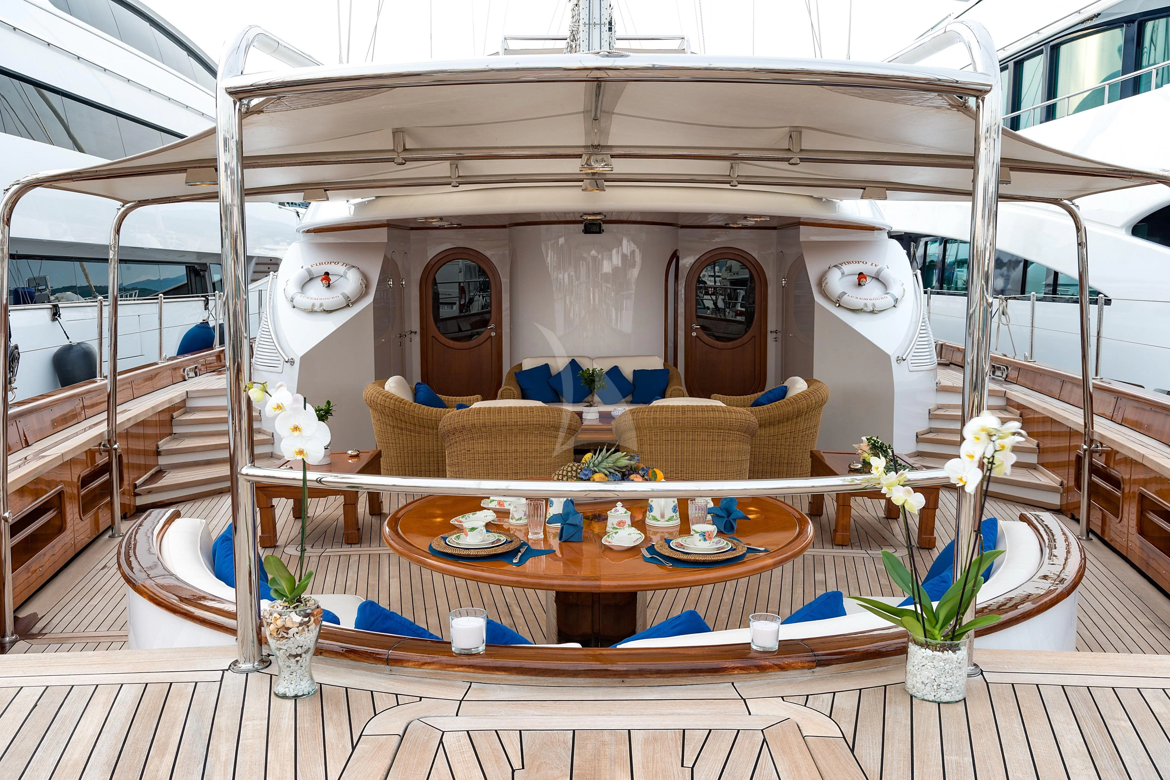 a table with food on it aboard TAMARITA Yacht for Sale