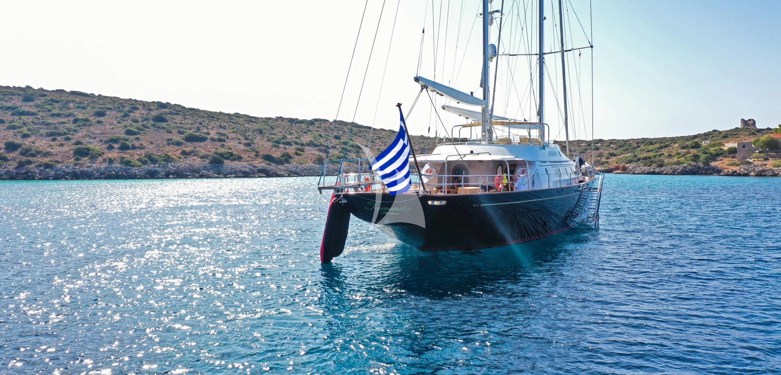 a boat on the water aboard TAMARITA Yacht for Sale
