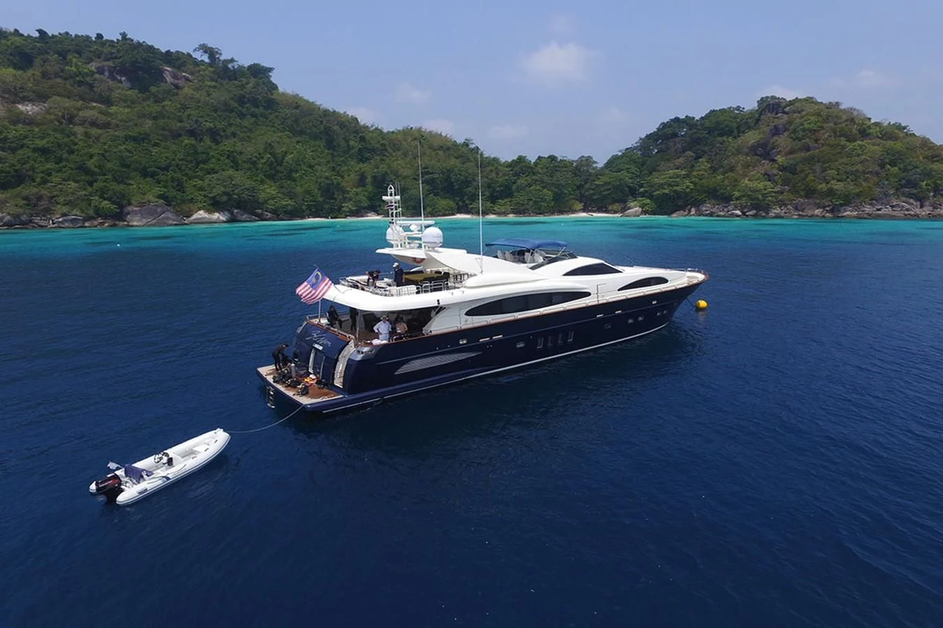 a boat sailing on the water aboard FOR YOUR EYES ONLY Yacht for Charter