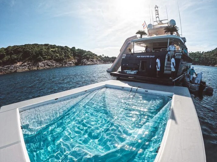 a boat on the water aboard FOR YOUR EYES ONLY Yacht for Charter