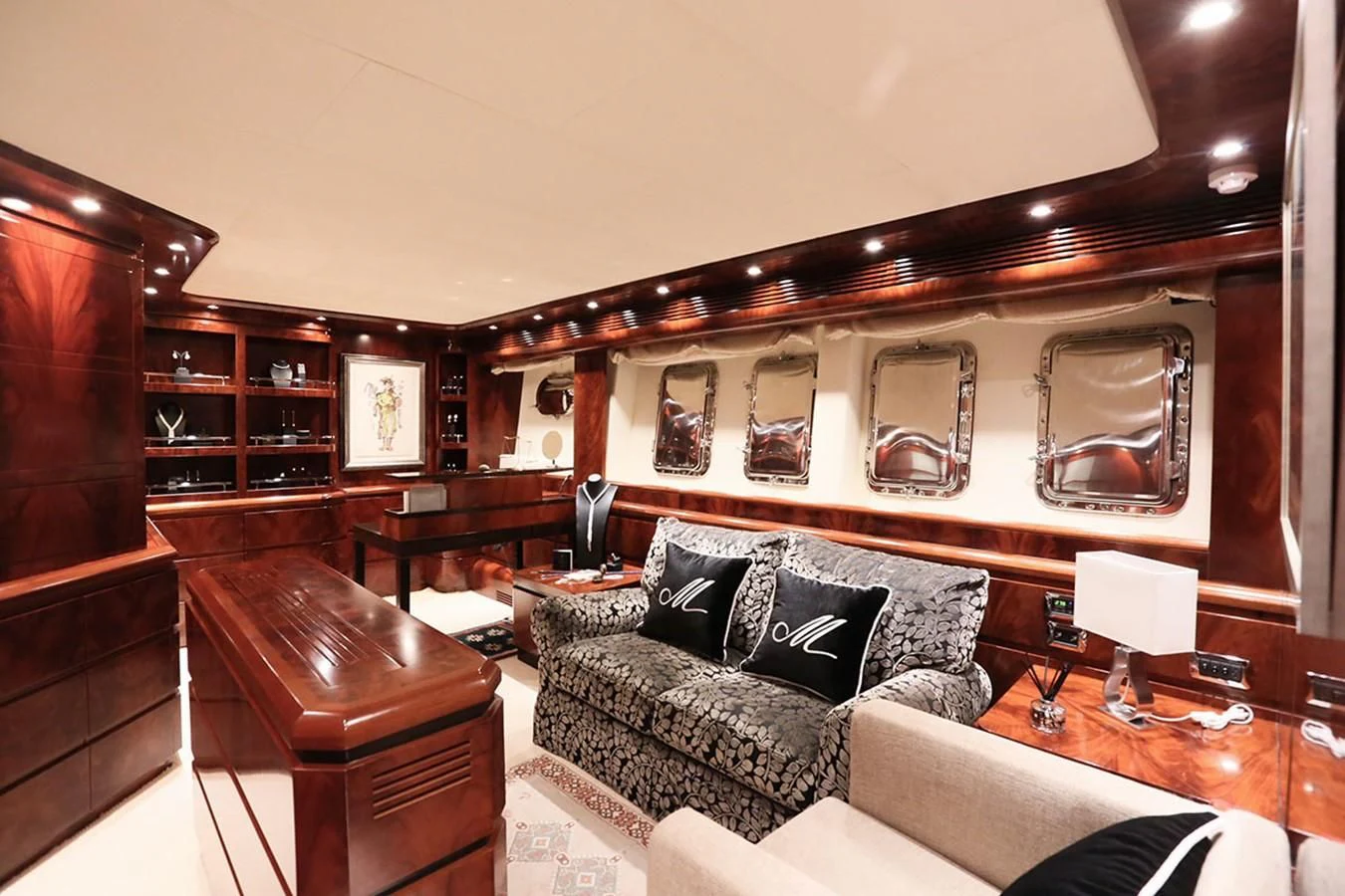 a living room with a couch and a coffee table aboard FOR YOUR EYES ONLY Yacht for Charter