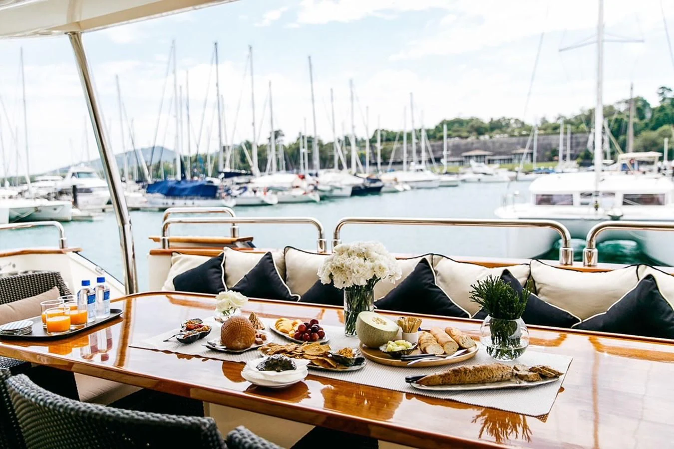 a table with food on it aboard FOR YOUR EYES ONLY Yacht for Charter
