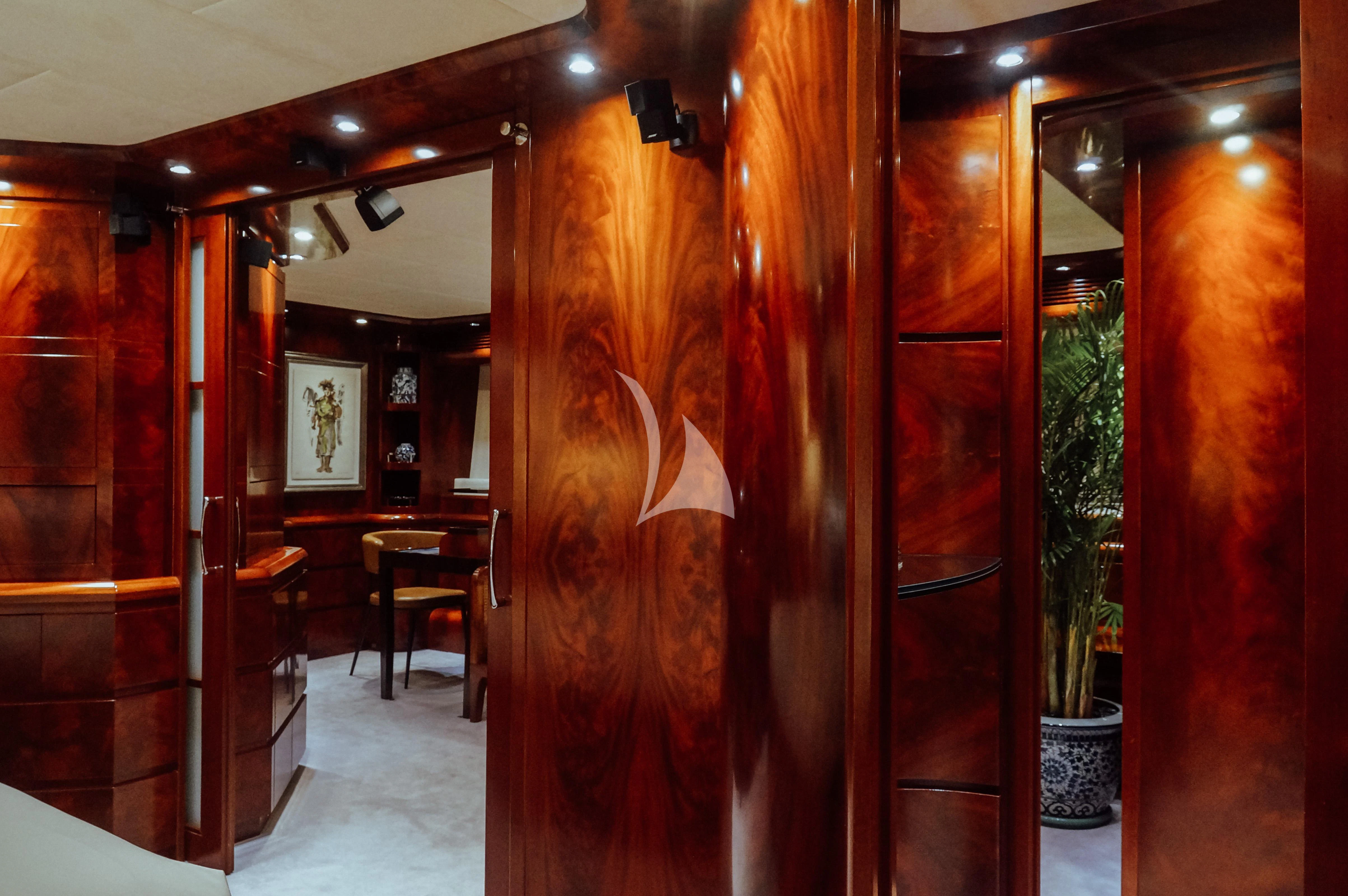 a room with wooden doors aboard FOR YOUR EYES ONLY Yacht for Charter