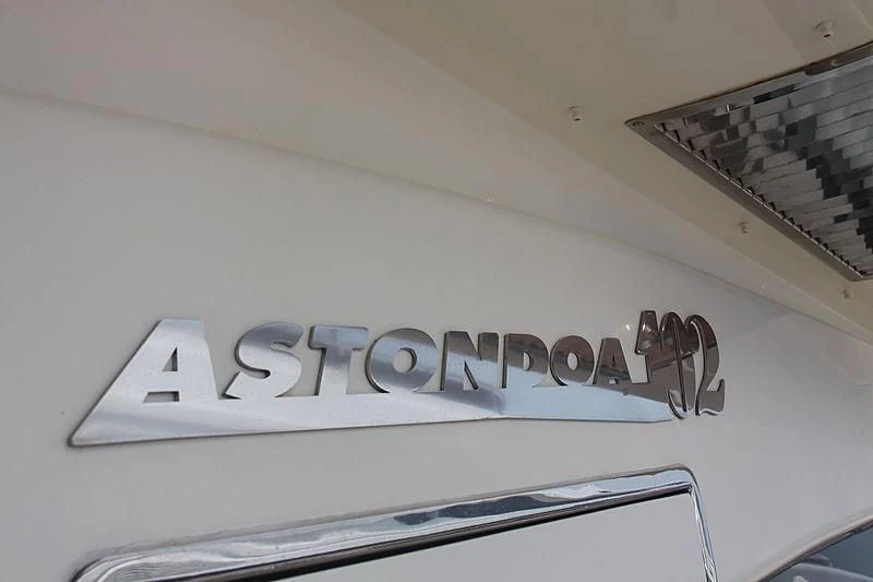 a white sign on a white wall aboard FOR YOUR EYES ONLY Yacht for Charter