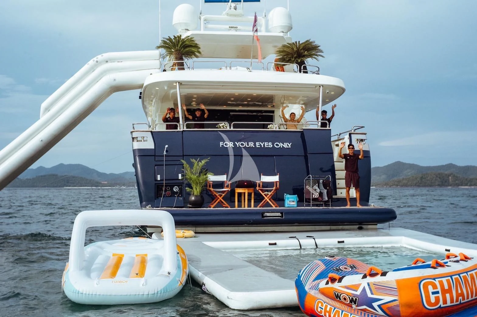 a boat with people on it aboard FOR YOUR EYES ONLY Yacht for Charter