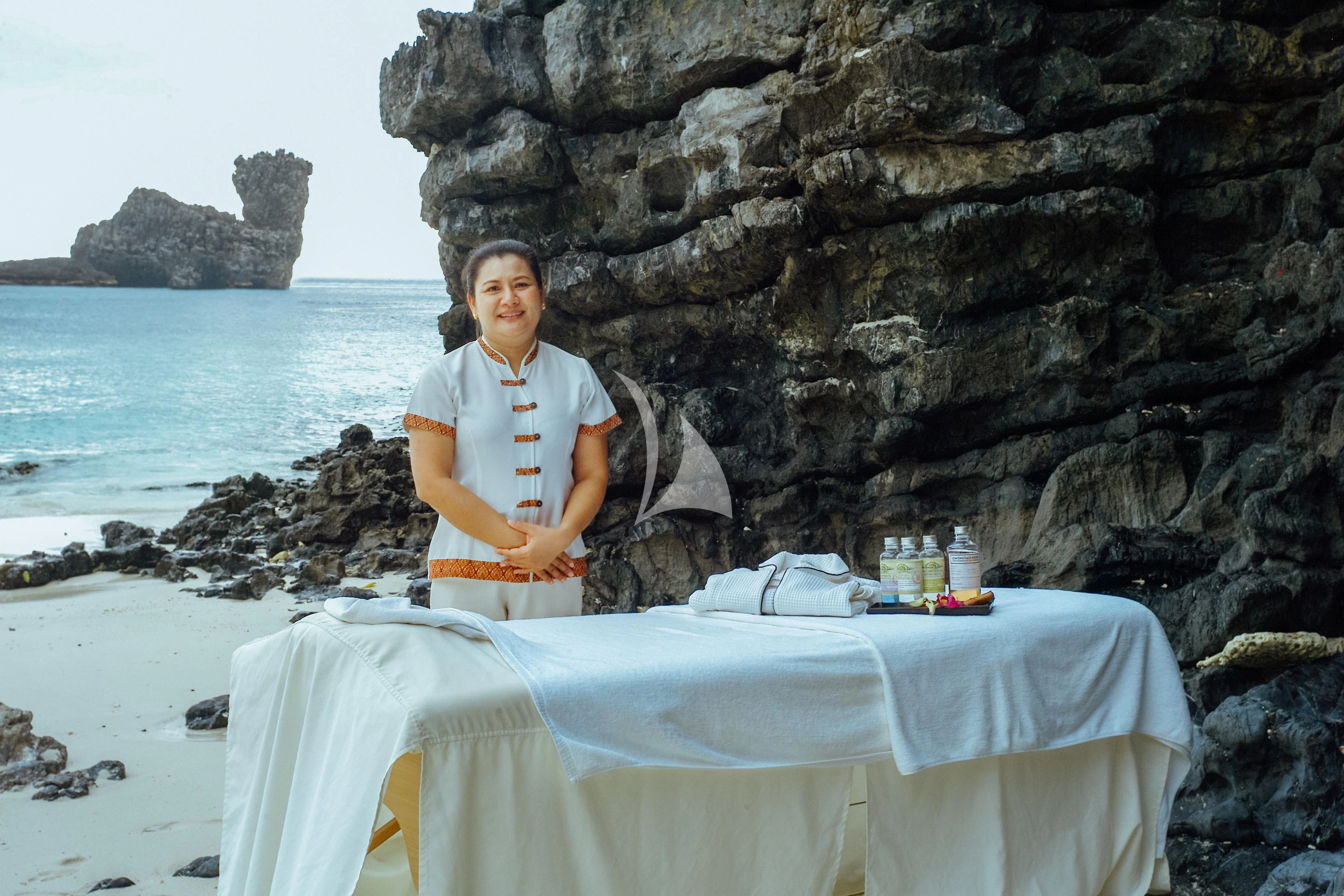 a man sitting at a table aboard FOR YOUR EYES ONLY Yacht for Charter