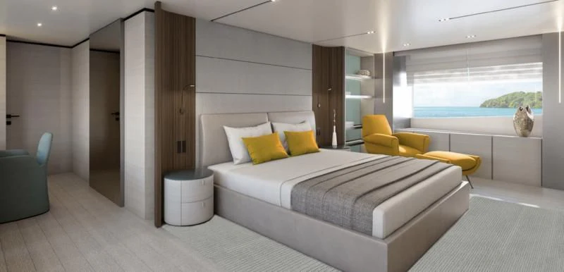 a modern bedroom with a large bed aboard HAIAMI I Yacht for Charter