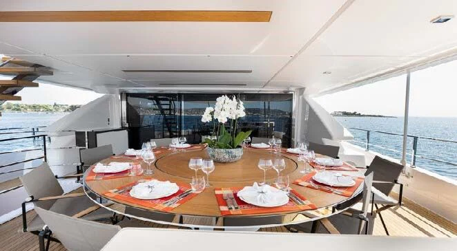 a table set for a meal on a boat aboard HAIAMI I Yacht for Charter
