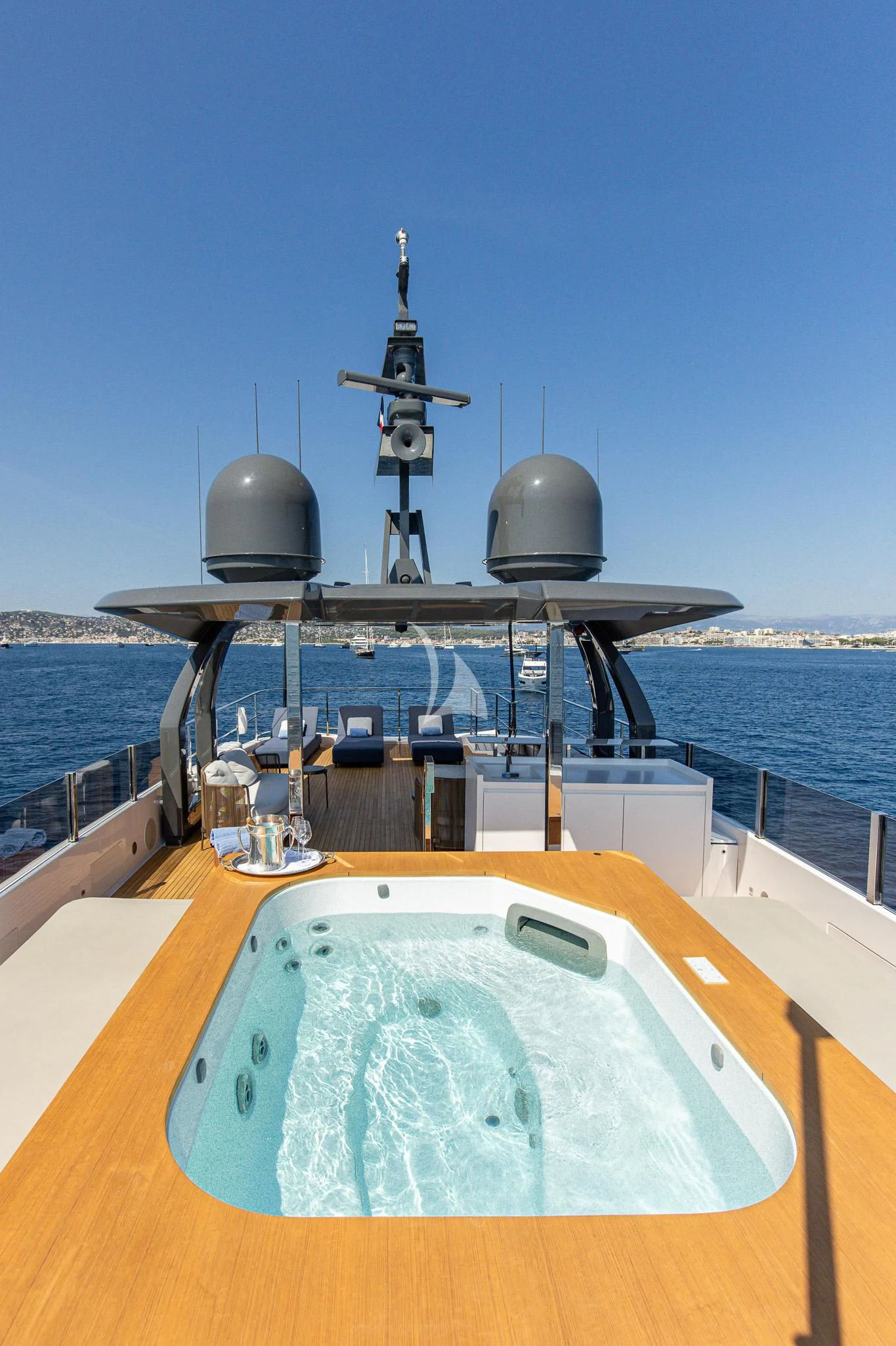 a large ship with a satellite dish on it aboard HAIAMI I Yacht for Charter