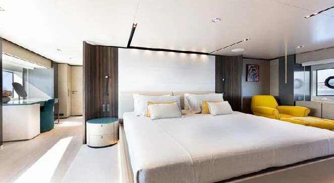 a large bed in a room aboard HAIAMI I Yacht for Charter