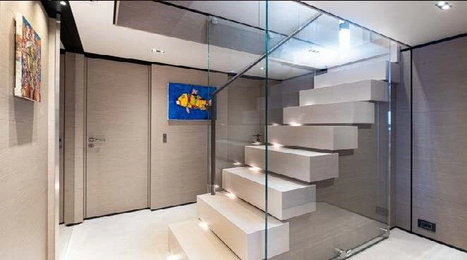 a room with a staircase and a door aboard HAIAMI I Yacht for Charter