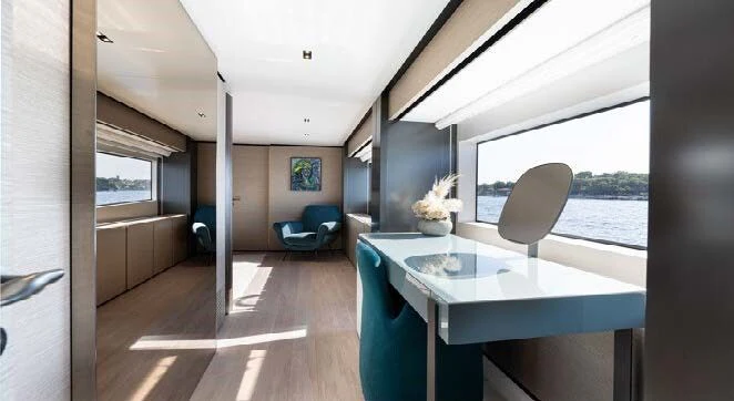 a room with a table and chairs aboard HAIAMI I Yacht for Charter