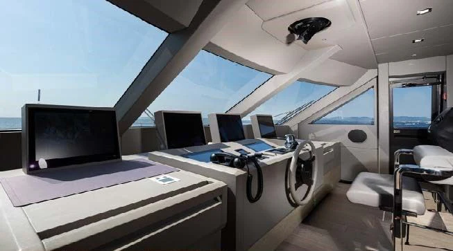 a room with a desk and computer aboard HAIAMI I Yacht for Charter