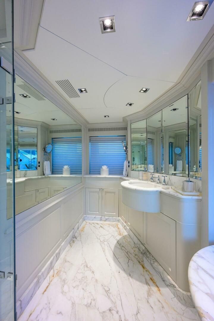 a bathroom with a large tub aboard ARTHUR’S WAY Yacht for Sale