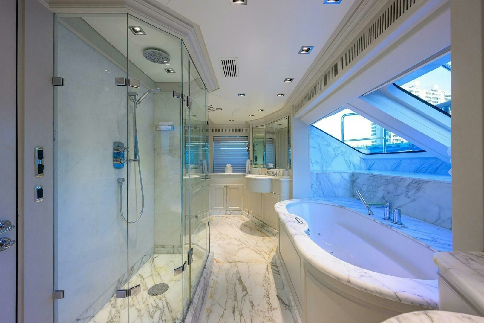 a bathroom with a shower aboard ARTHUR’S WAY Yacht for Sale