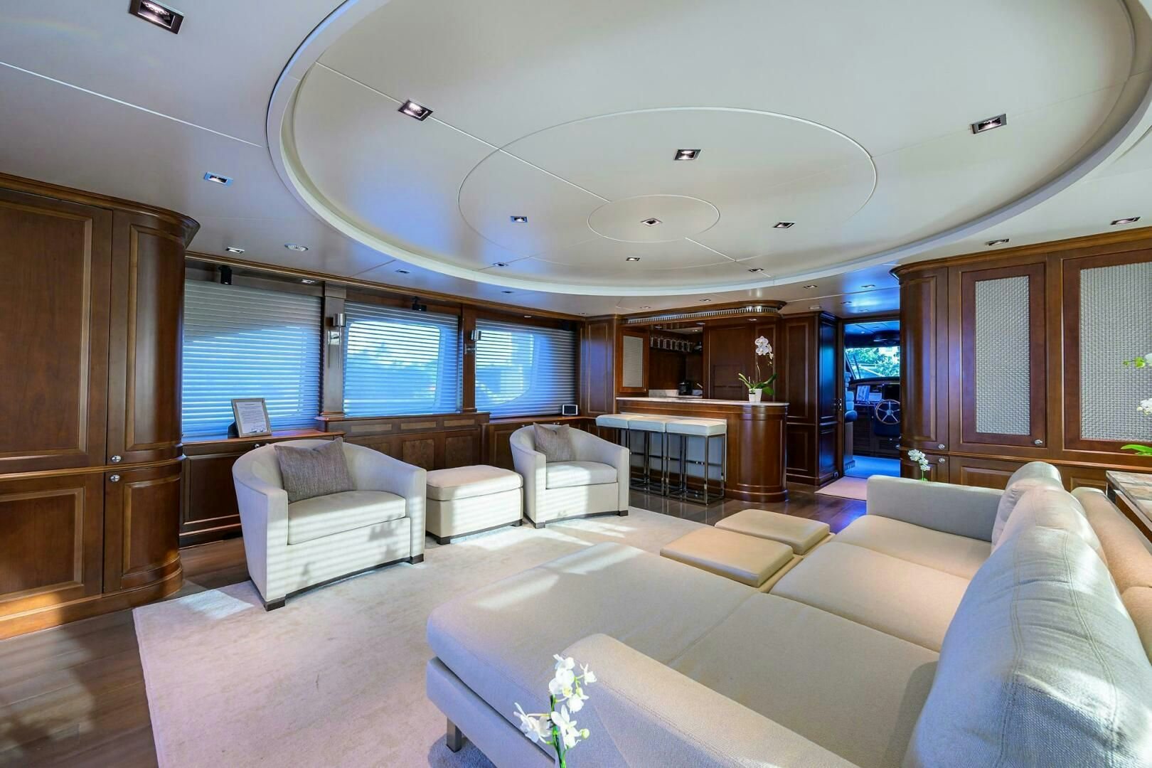 a room with couches and a television aboard ARTHUR’S WAY Yacht for Sale