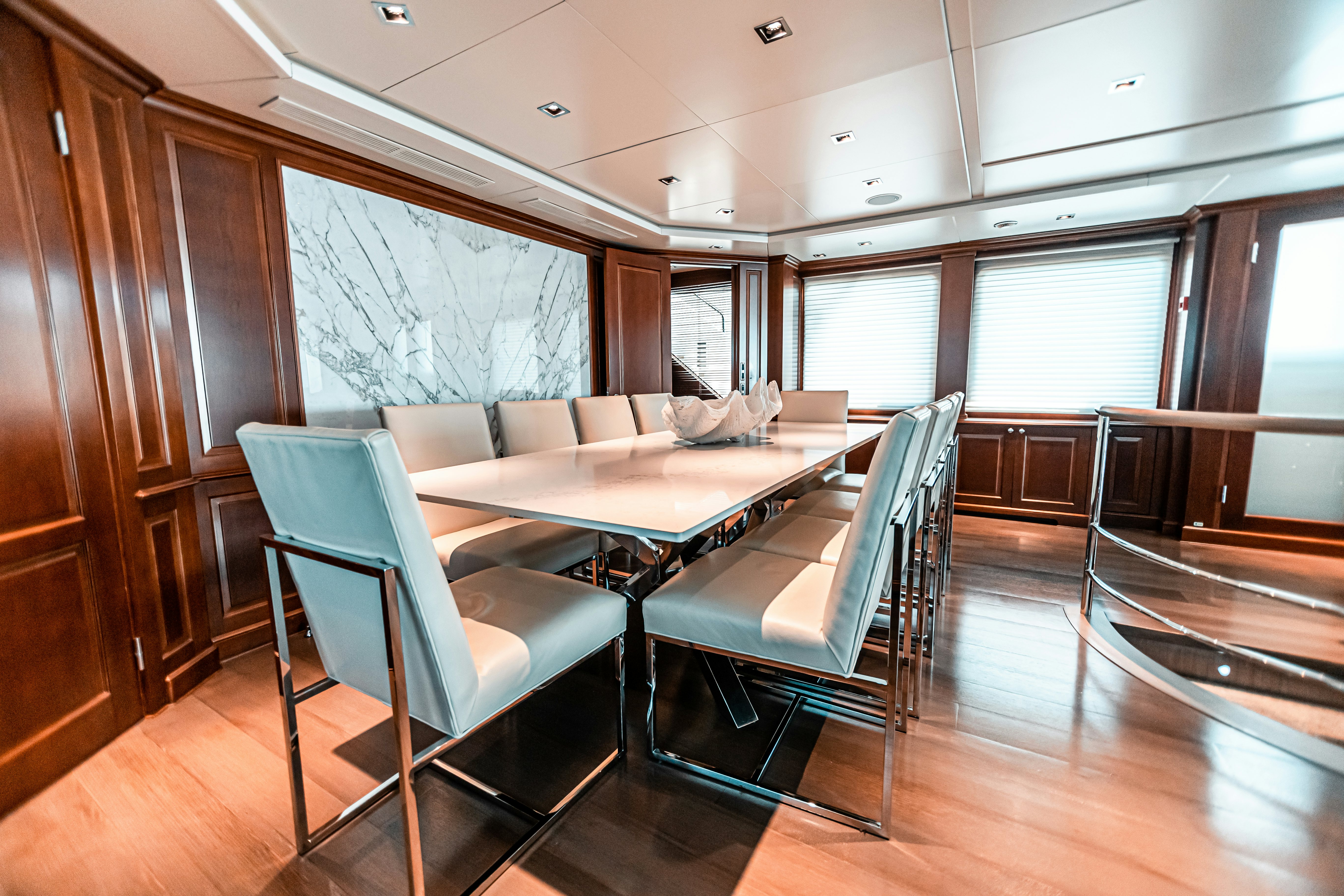 a room with a table and chairs aboard ARTHUR’S WAY Yacht for Sale