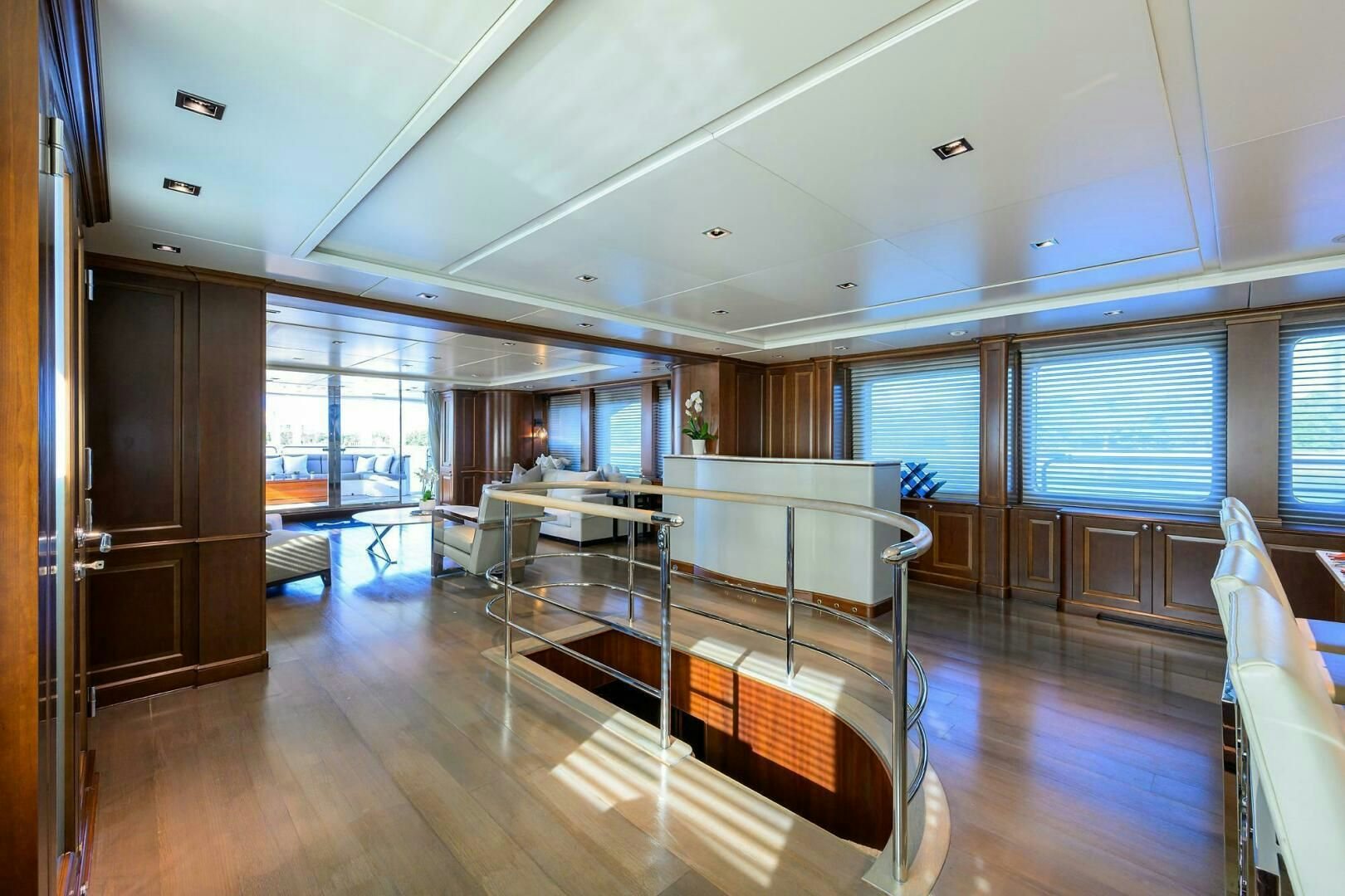 a room with a bed and a table aboard ARTHUR’S WAY Yacht for Sale