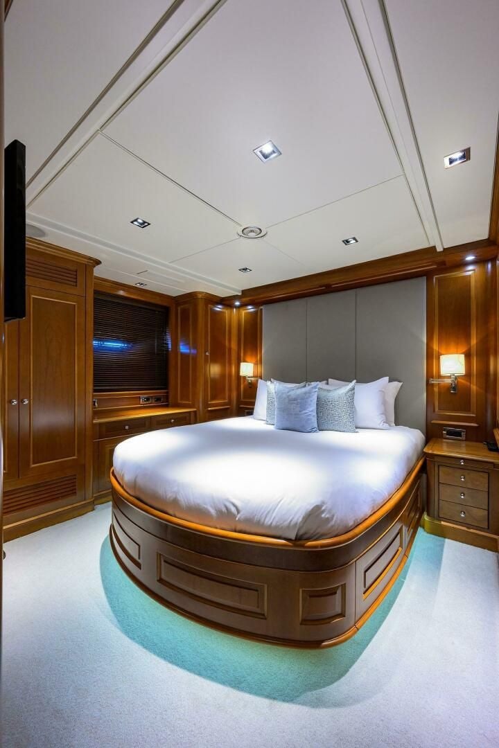 a bed in a room aboard ARTHUR’S WAY Yacht for Sale
