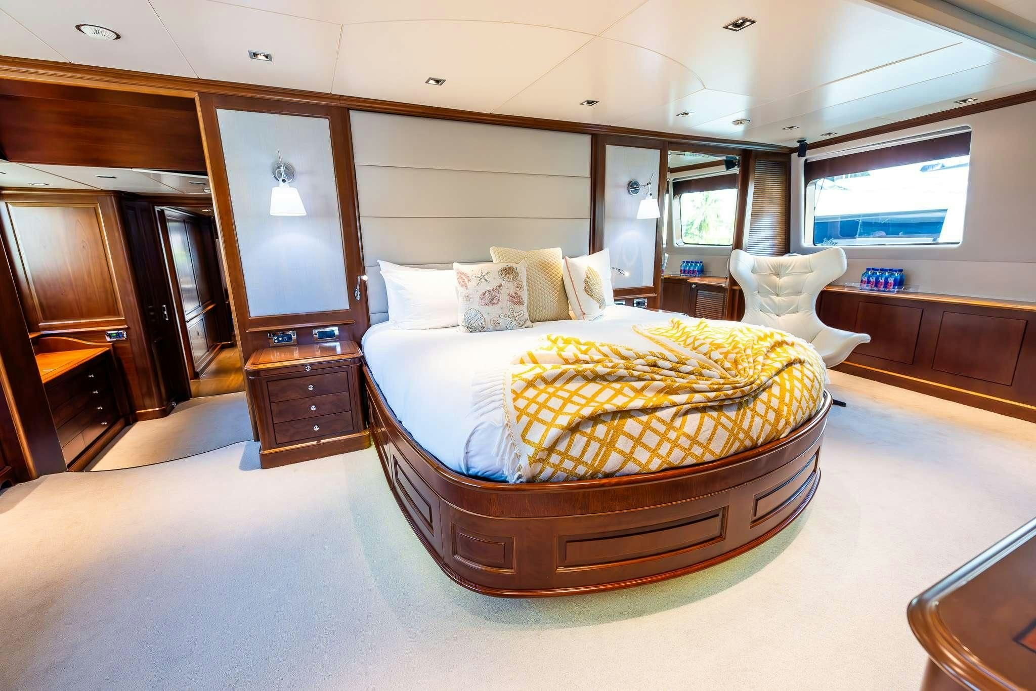 a bed in a room aboard ARTHUR’S WAY Yacht for Sale