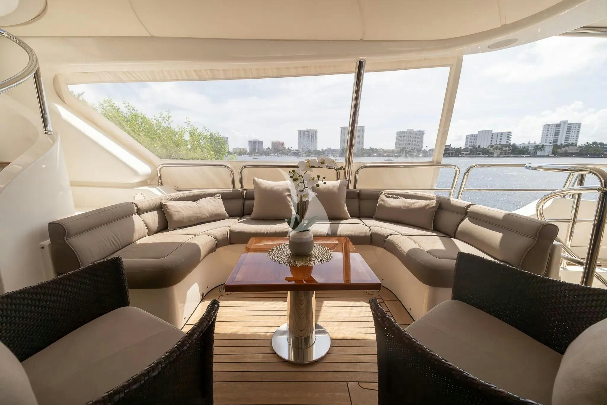 a living room with a large window aboard ARTHUR’S WAY Yacht for Sale