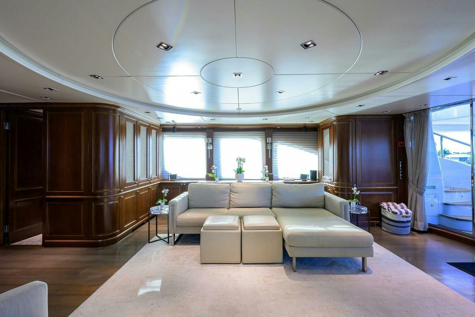 a living room with a large window aboard ARTHUR’S WAY Yacht for Sale