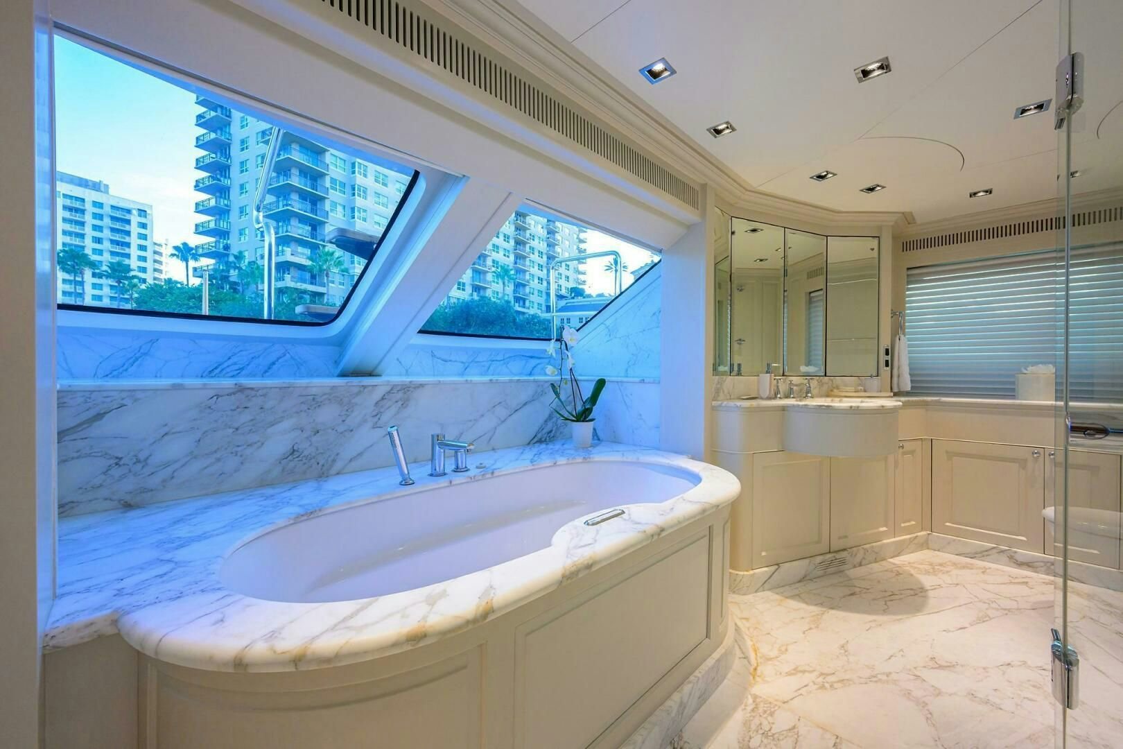 a large bathroom with a large tub aboard ARTHUR’S WAY Yacht for Sale