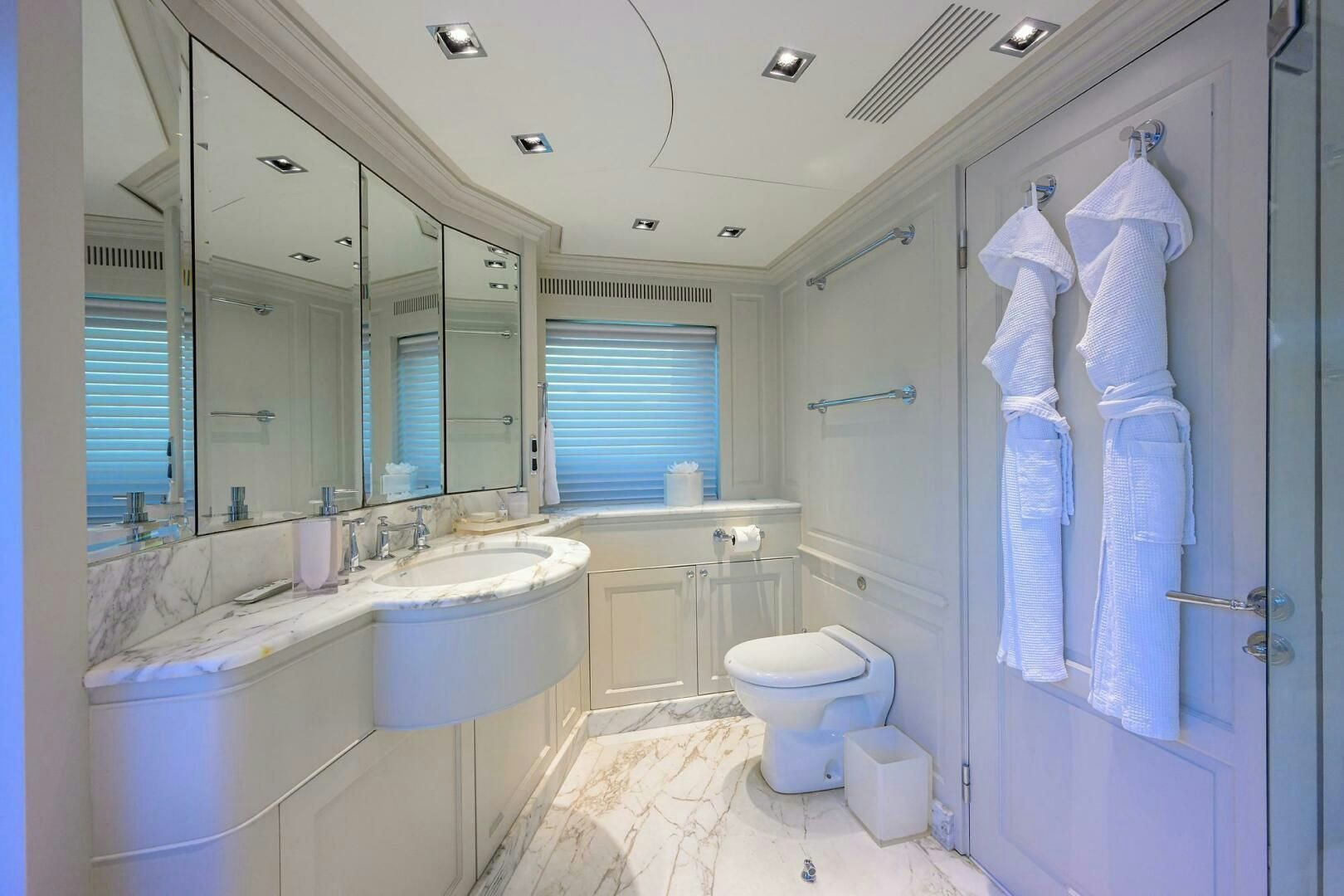 a bathroom with a bathtub sink and toilet aboard ARTHUR’S WAY Yacht for Sale