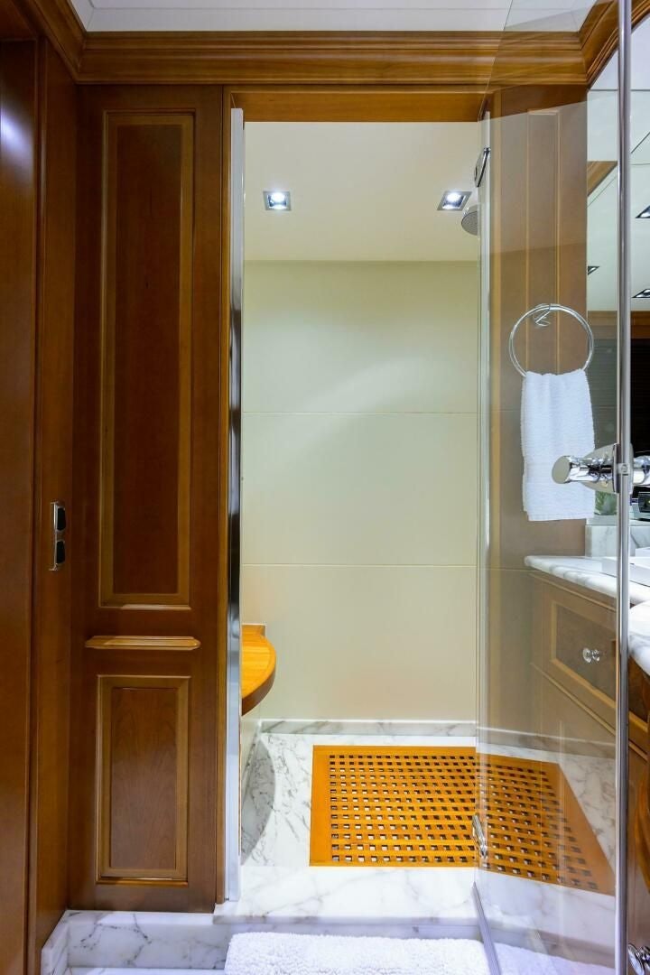 a bathroom with a shower unit aboard ARTHUR’S WAY Yacht for Sale