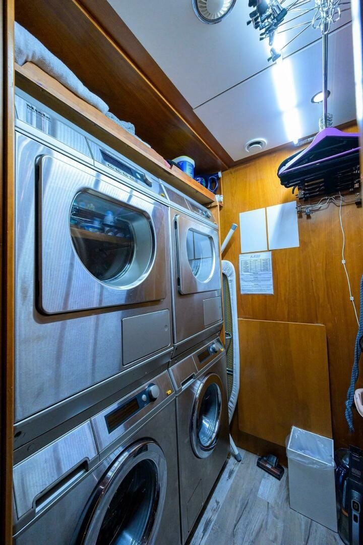 a kitchen with a washing machine aboard ARTHUR’S WAY Yacht for Sale