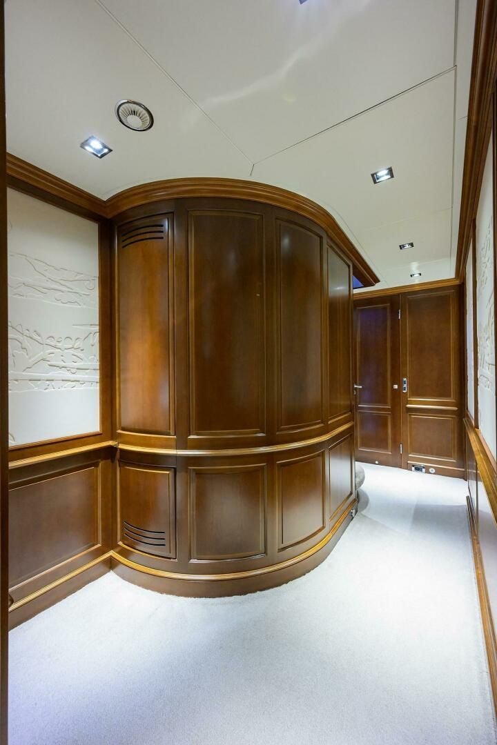 a wooden cabinet in a room aboard ARTHUR’S WAY Yacht for Sale