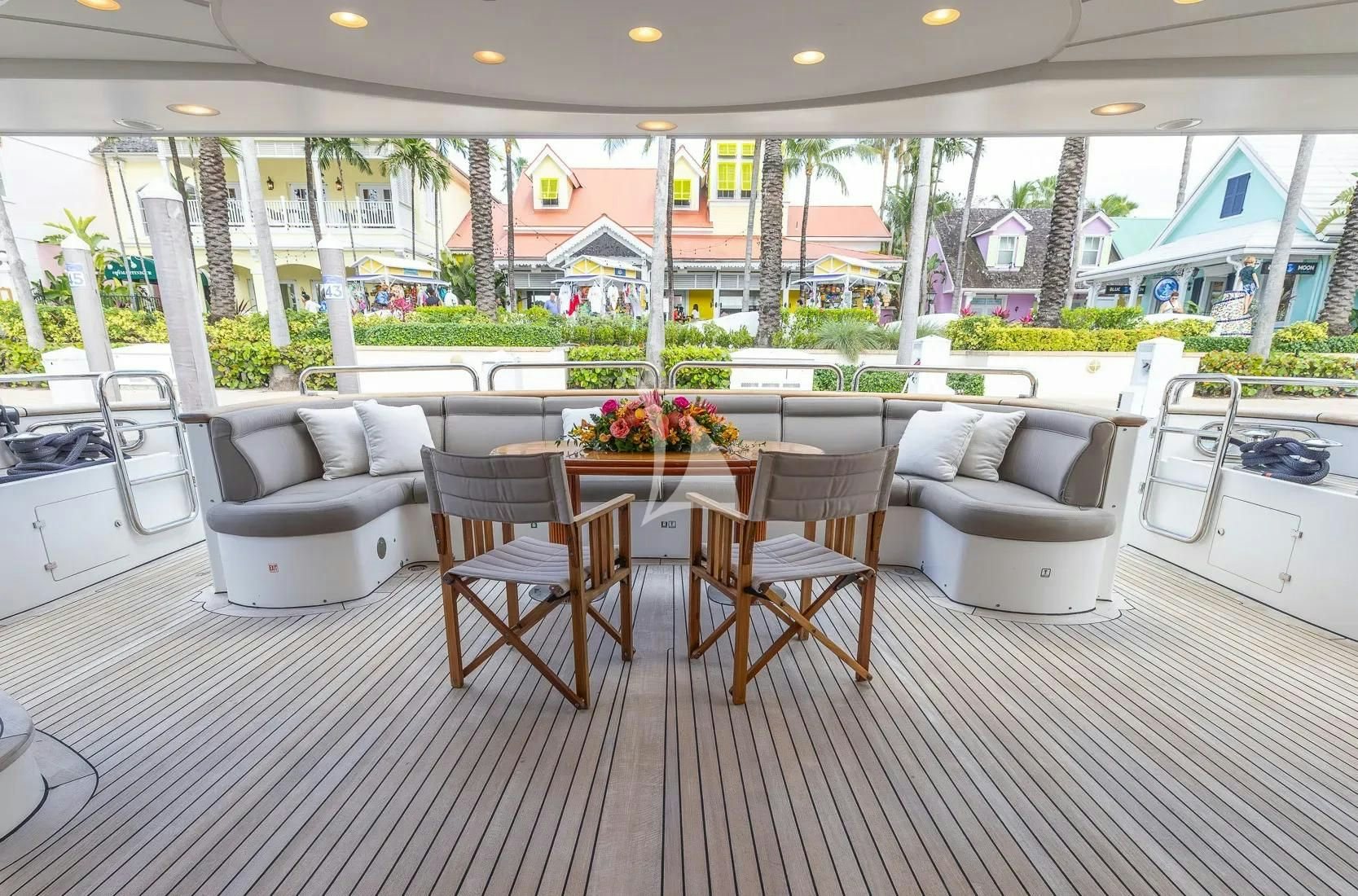 a large room with a table and chairs aboard ARTHUR’S WAY Yacht for Sale
