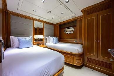 a room with two beds aboard ARTHUR’S WAY Yacht for Sale