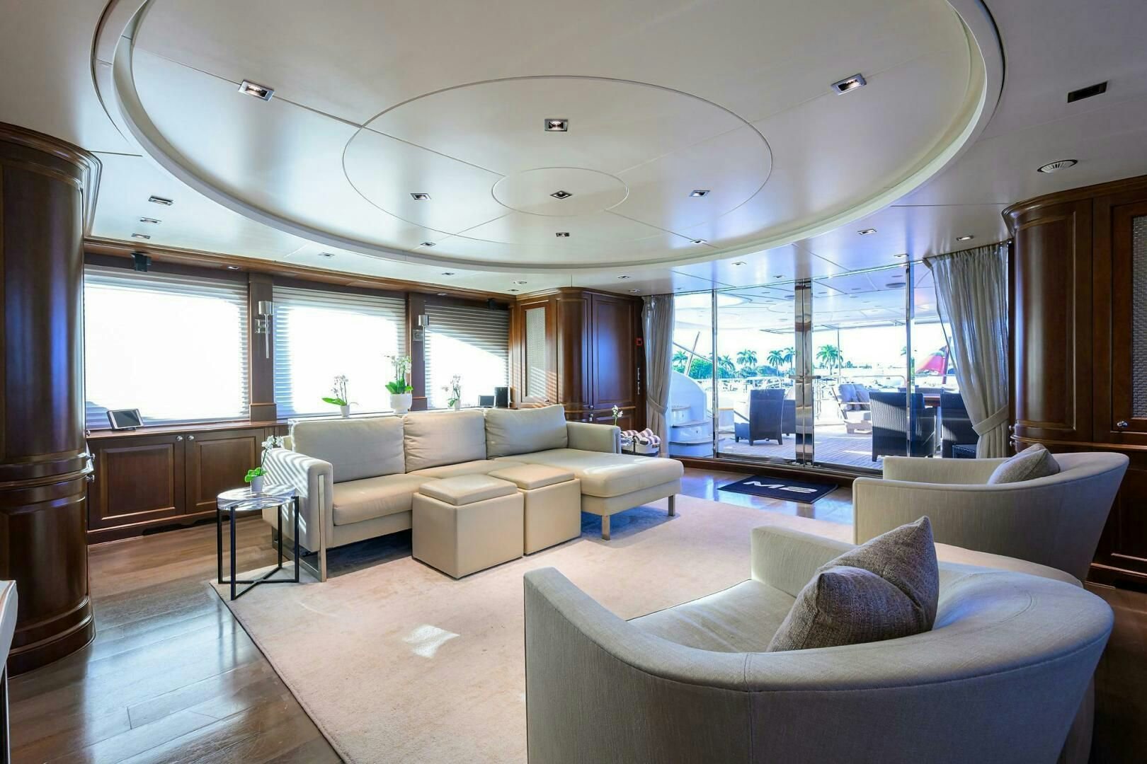 a living room with a large window aboard ARTHUR’S WAY Yacht for Sale