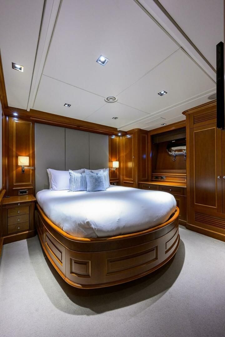a bed in a room aboard ARTHUR’S WAY Yacht for Sale