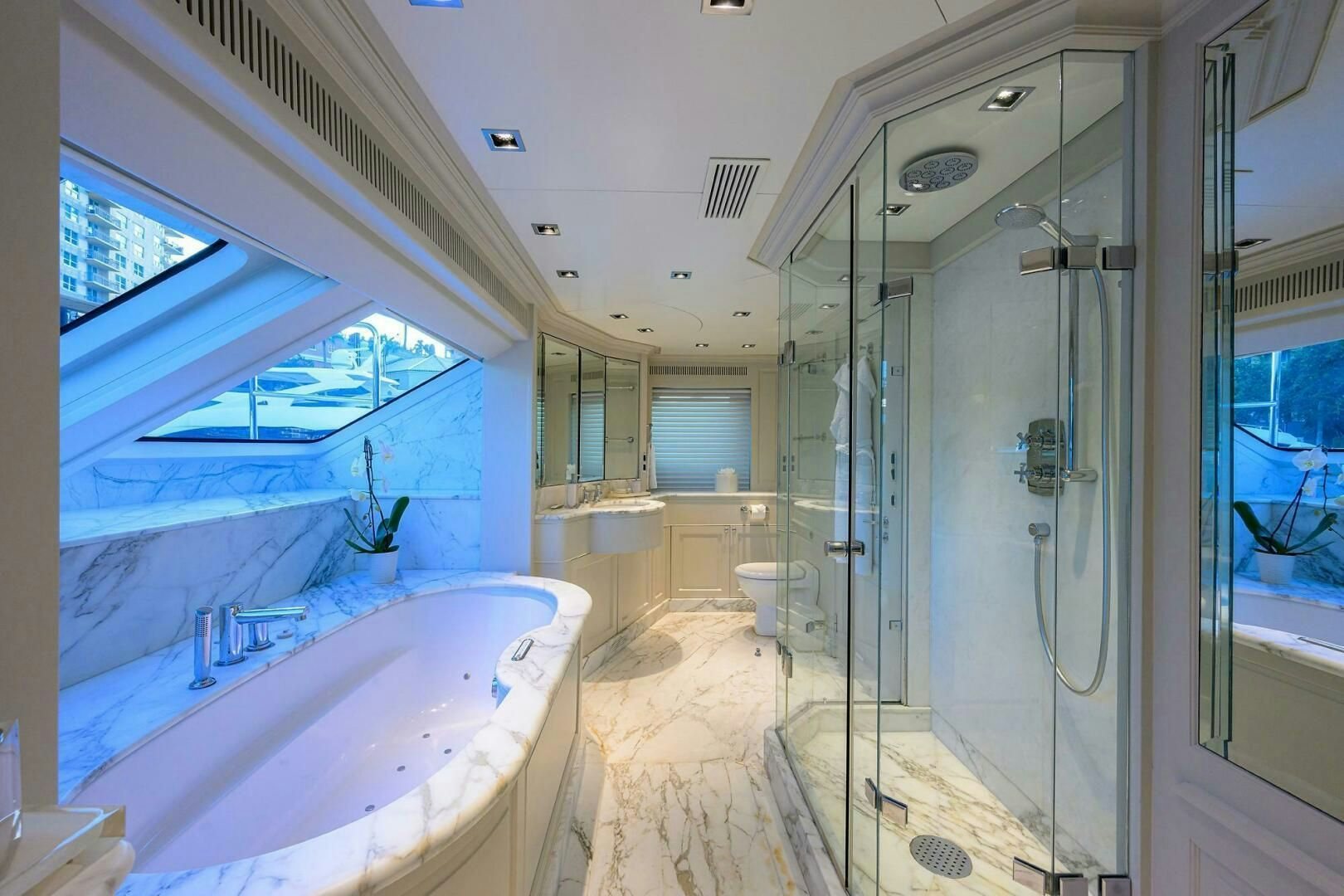a large bathroom with a tub aboard ARTHUR’S WAY Yacht for Sale