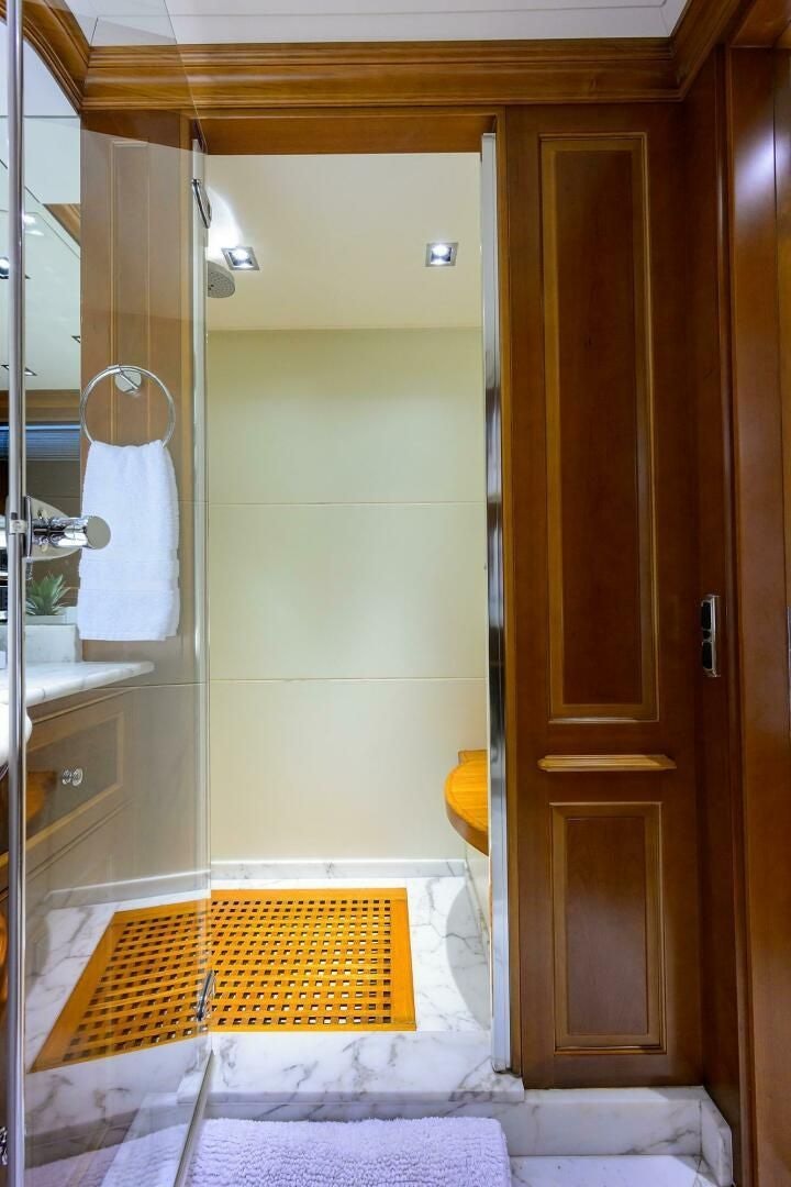 a bathroom with a shower unit aboard ARTHUR’S WAY Yacht for Sale
