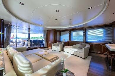 a living room with a large window aboard ARTHUR’S WAY Yacht for Sale