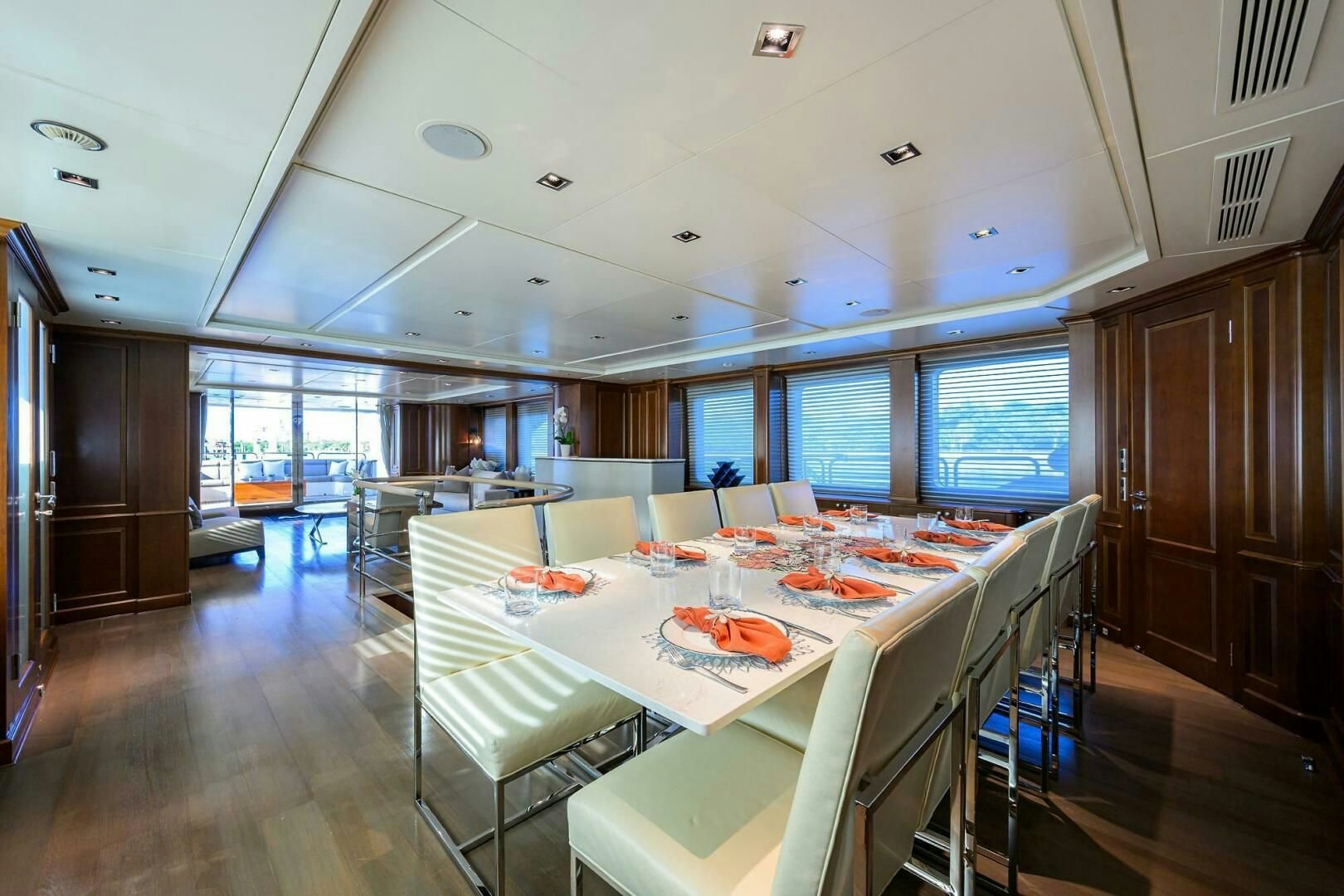 a large dining room with a large table and chairs aboard ARTHUR’S WAY Yacht for Sale