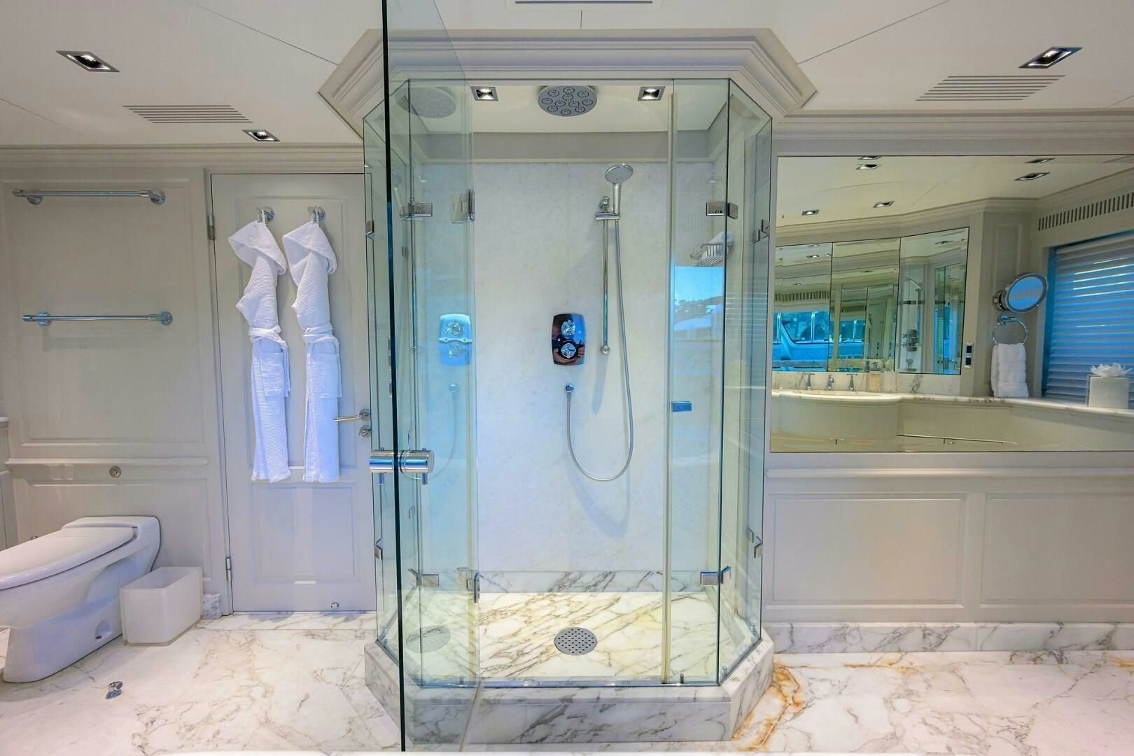 a bathroom with a shower aboard ARTHUR’S WAY Yacht for Sale