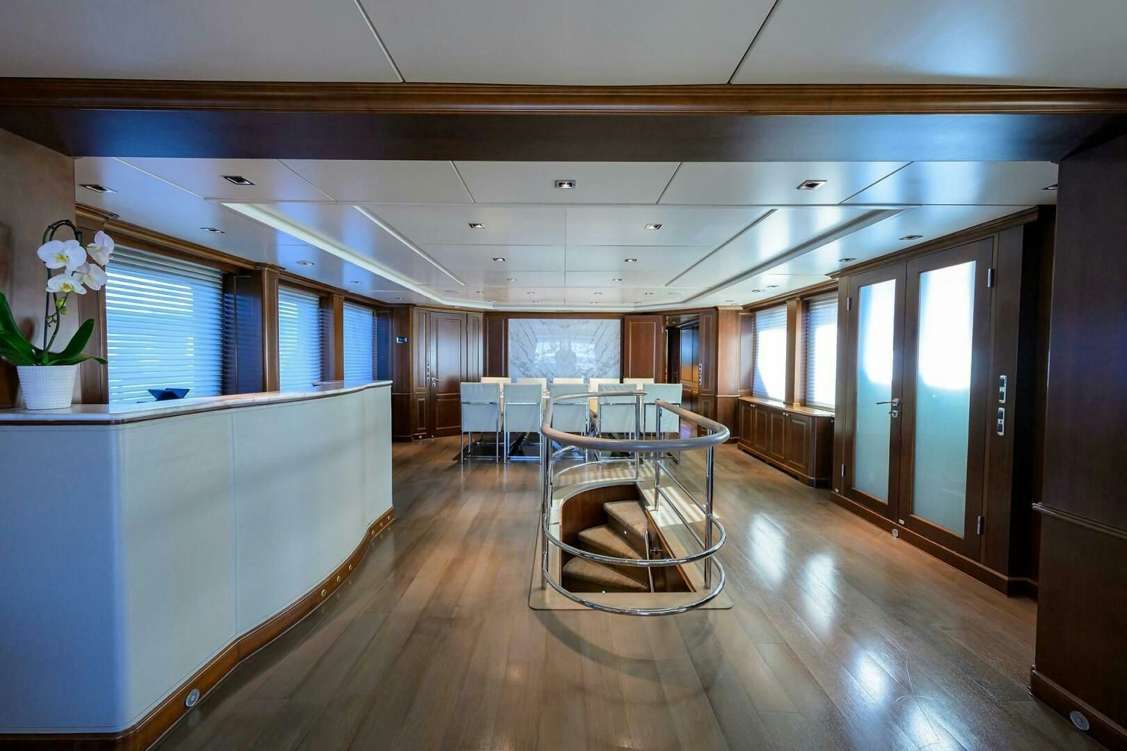 a room with a table and chairs aboard ARTHUR’S WAY Yacht for Sale