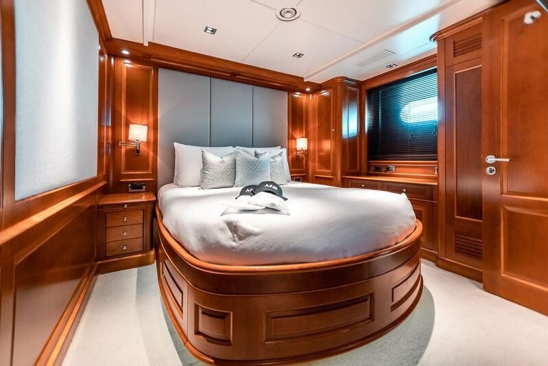 a bed in a room aboard ARTHUR’S WAY Yacht for Sale
