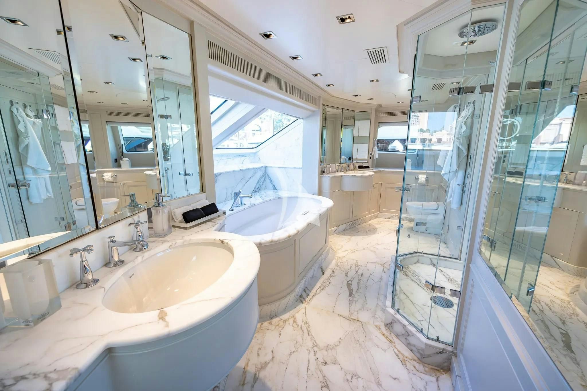 a bathroom with a tub sink and a shower aboard ARTHUR’S WAY Yacht for Sale