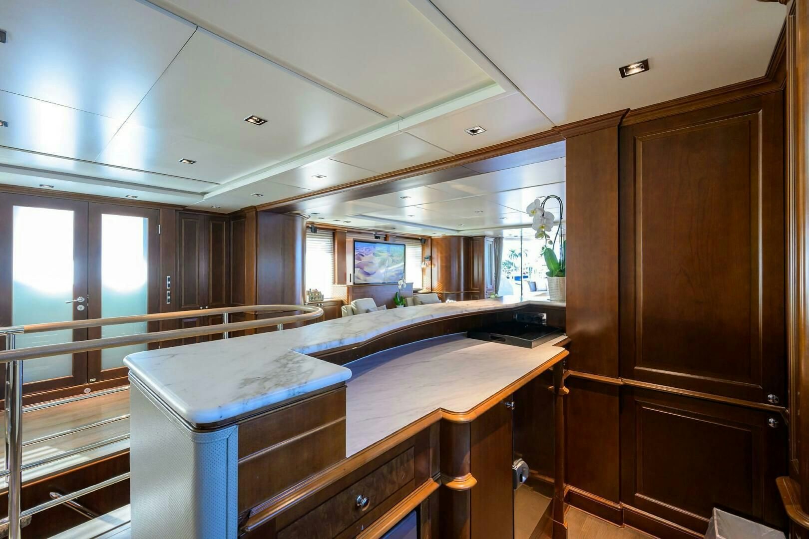 a room with a bed and desk aboard ARTHUR’S WAY Yacht for Sale
