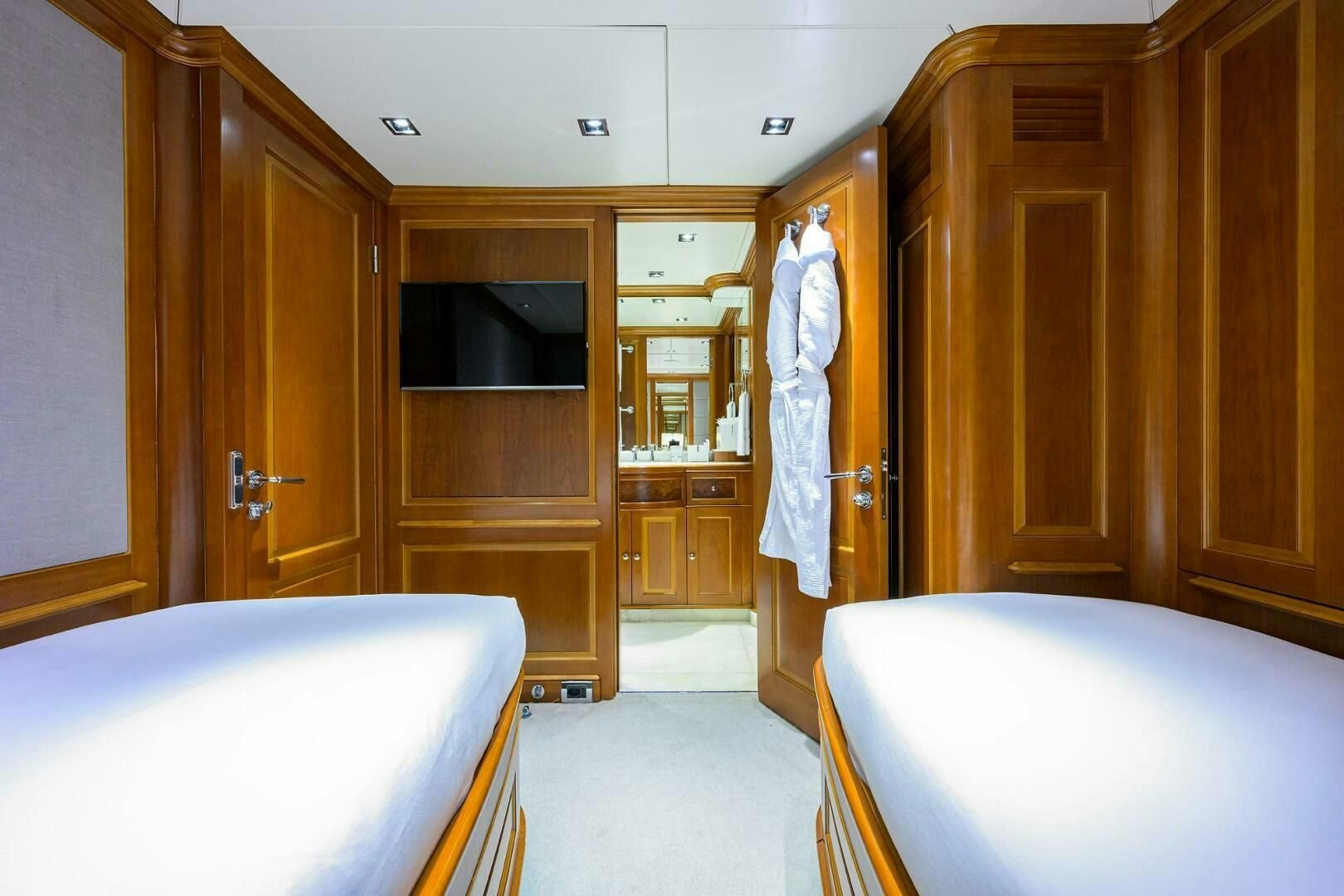 a room with a bed and a closet aboard ARTHUR’S WAY Yacht for Sale