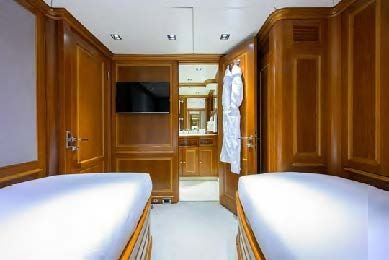a bathroom with a tub and cabinets aboard ARTHUR’S WAY Yacht for Sale