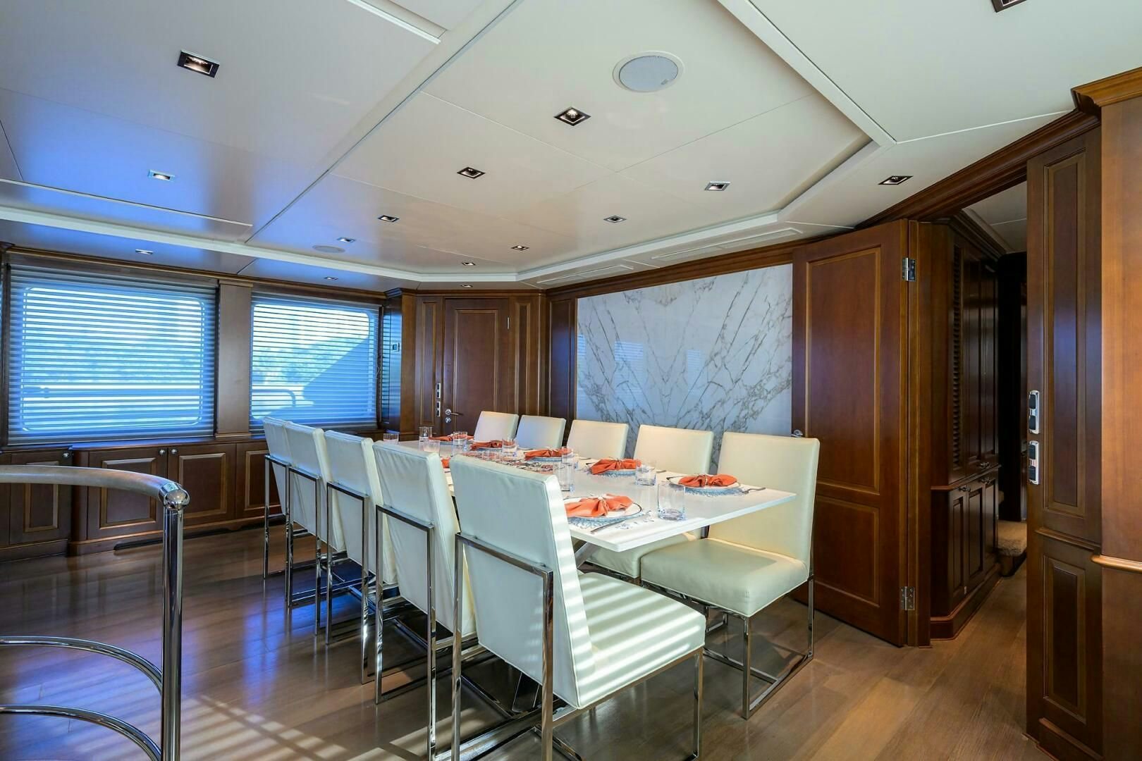 a dining room with a table and chairs aboard ARTHUR’S WAY Yacht for Sale