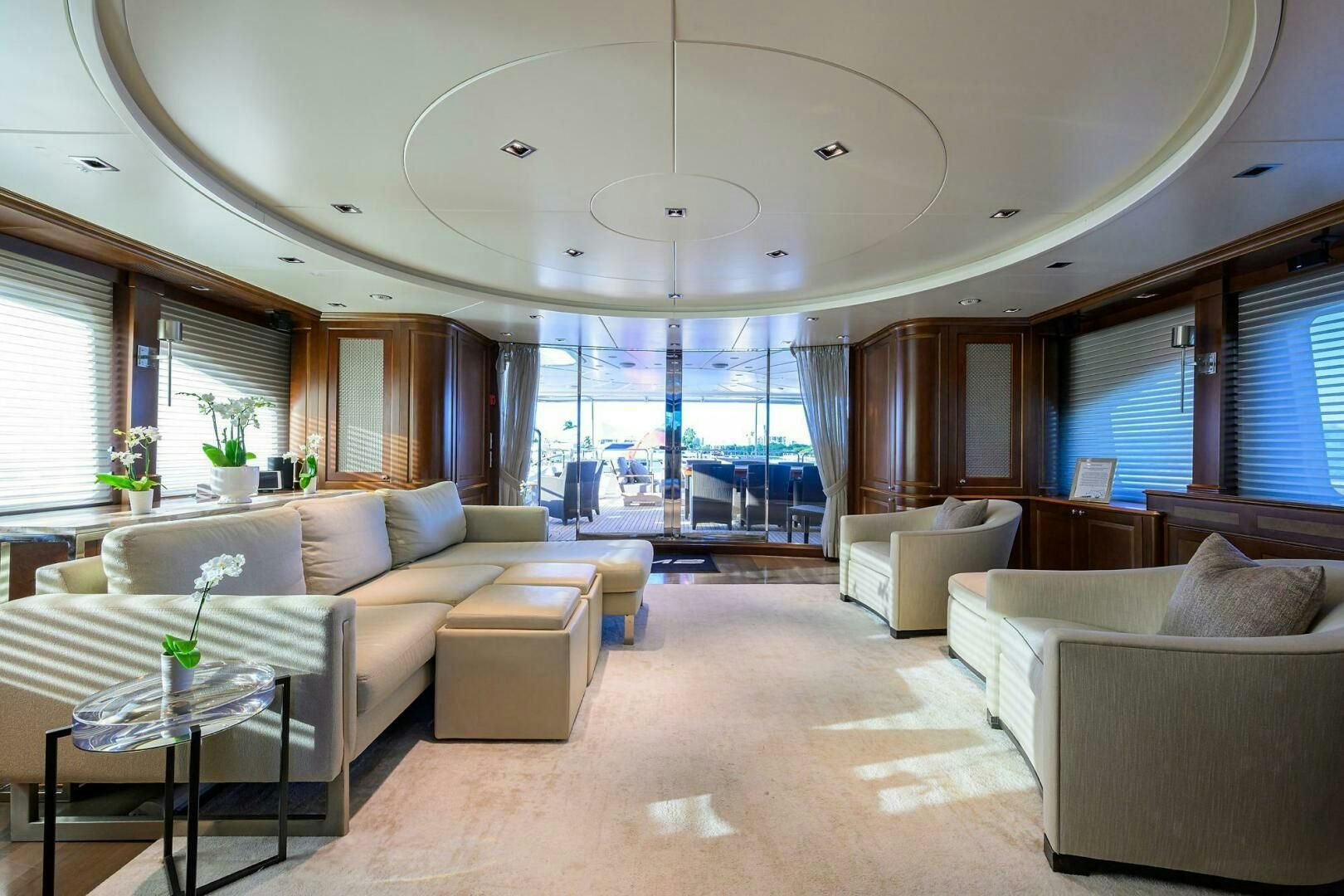 a living room with a large window aboard ARTHUR’S WAY Yacht for Sale