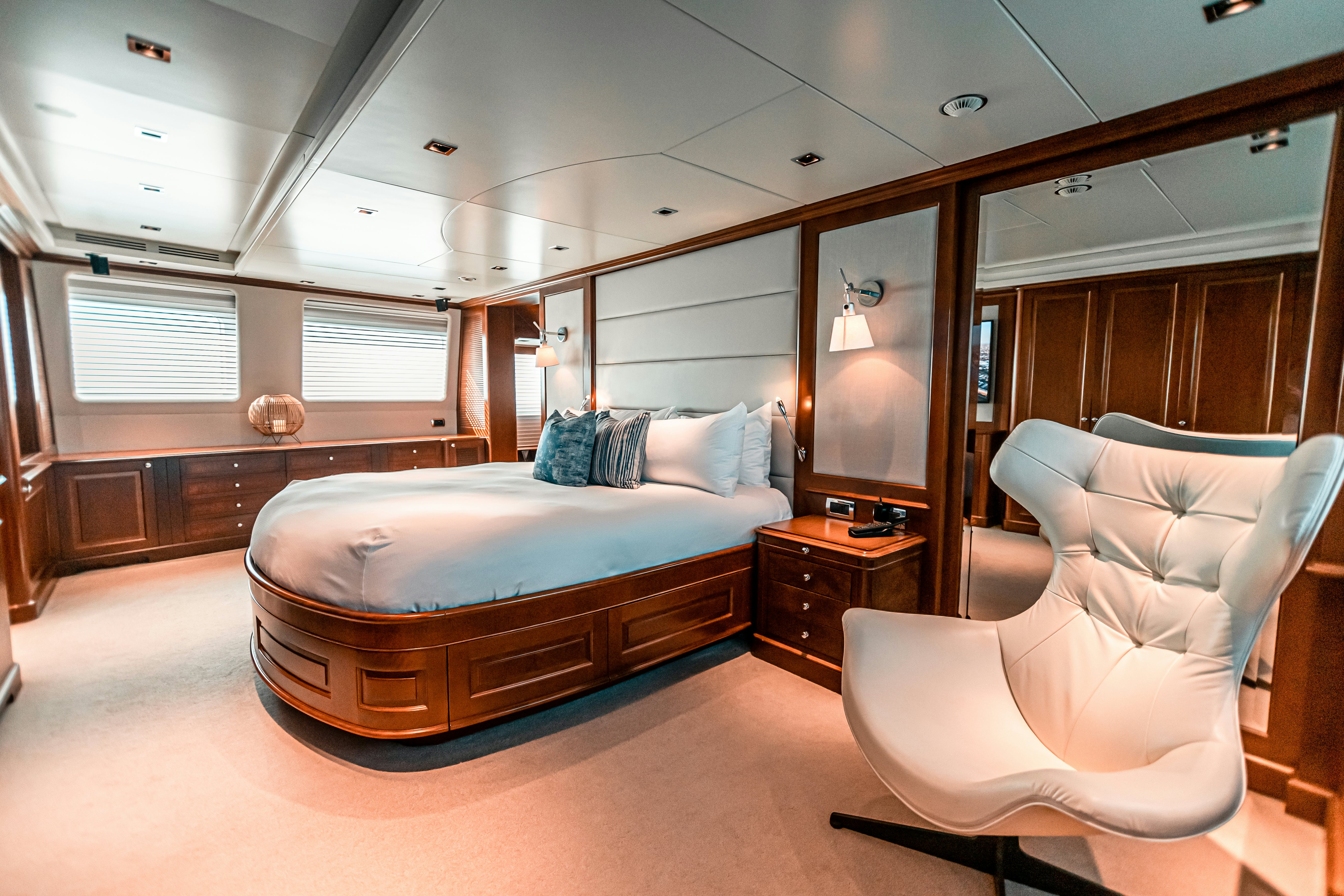 a bedroom with a bed and a couch aboard ARTHUR’S WAY Yacht for Sale