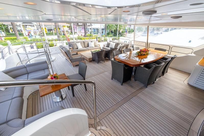 a room with a table and chairs aboard ARTHUR’S WAY Yacht for Sale